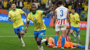 Vinicius celebrates scoring for Brazil